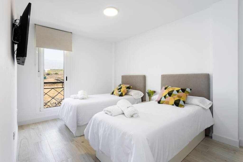 Sunnyland Apartment Arona โช ภายนอก รูปภาพ