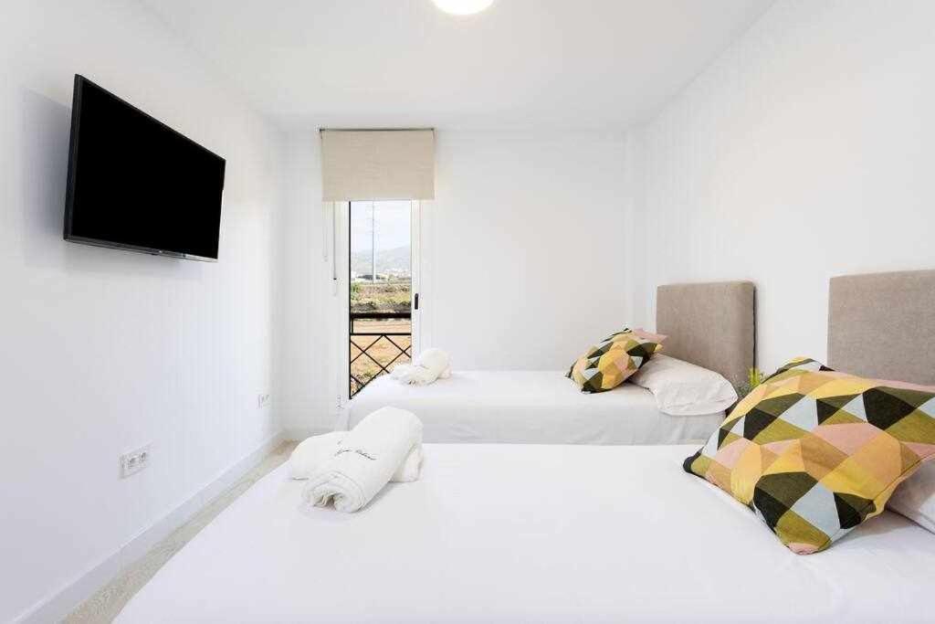 Sunnyland Apartment Arona โช ภายนอก รูปภาพ